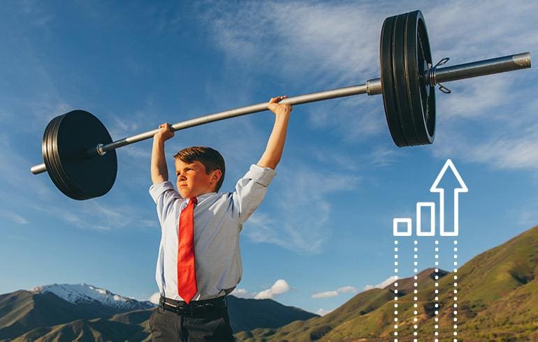 Kid lifting barbell