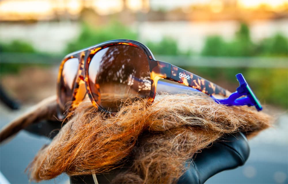 Goodr product shots of Shaves Legs, Grows Beard sunglass model.