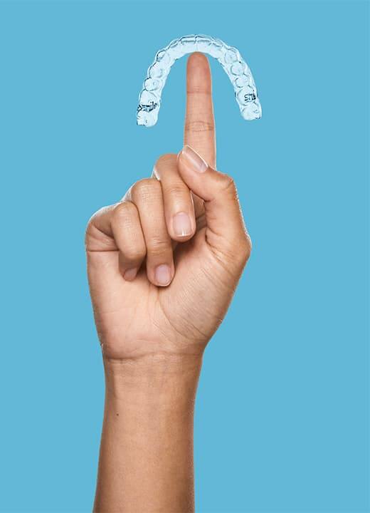 hand with mouth guard